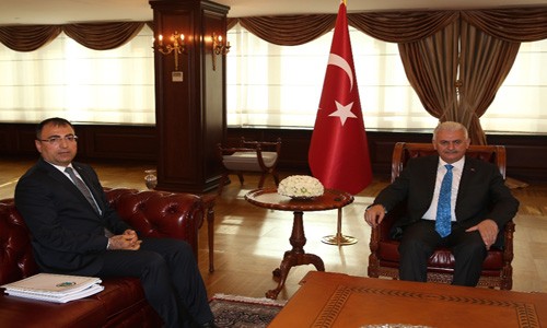Başbakan Aziz Kocaoğlu'yla görüştü