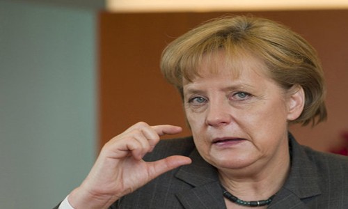 Merkel'den Davutoğlu'na tebrik